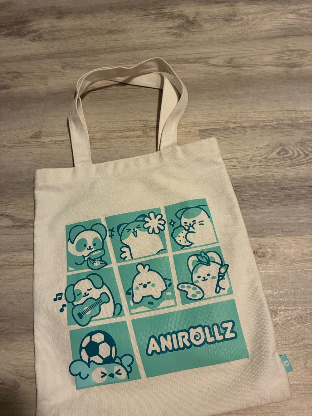 Cream Canvas Tote Bag with Teal Character Panel